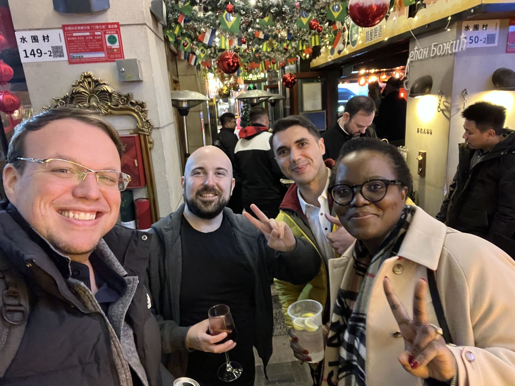 Holiday meetup group selfie at Brass House
